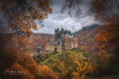 Eltz Castle (German: Burg Eltz) is a medieval castle nestled in the hills above the Moselle River between Koblenz and Trier, Germany. It is still owned by a branch of the same family (the Eltz family) that lived there in the 12th century, 33 generations ago. Bürresheim Castle (Schloss Bürresheim), Eltz Castle and Lissingen Castle are the only castles on the left bank of the Rhine in Rhineland-Palatinate which have never been destroyed.